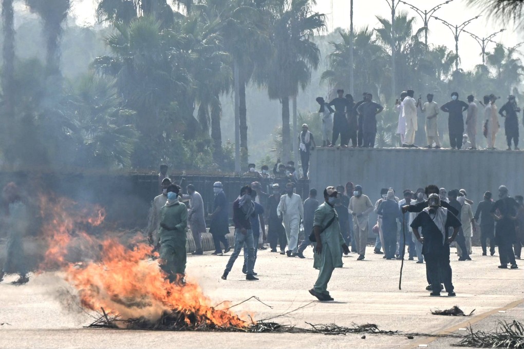 Supporters and activists of former prime minister Imran Khan’s Pakistan Tehreek-e-Insaf (PTI) party take part in a protest in Islamabad on October 5. Photo: AFP