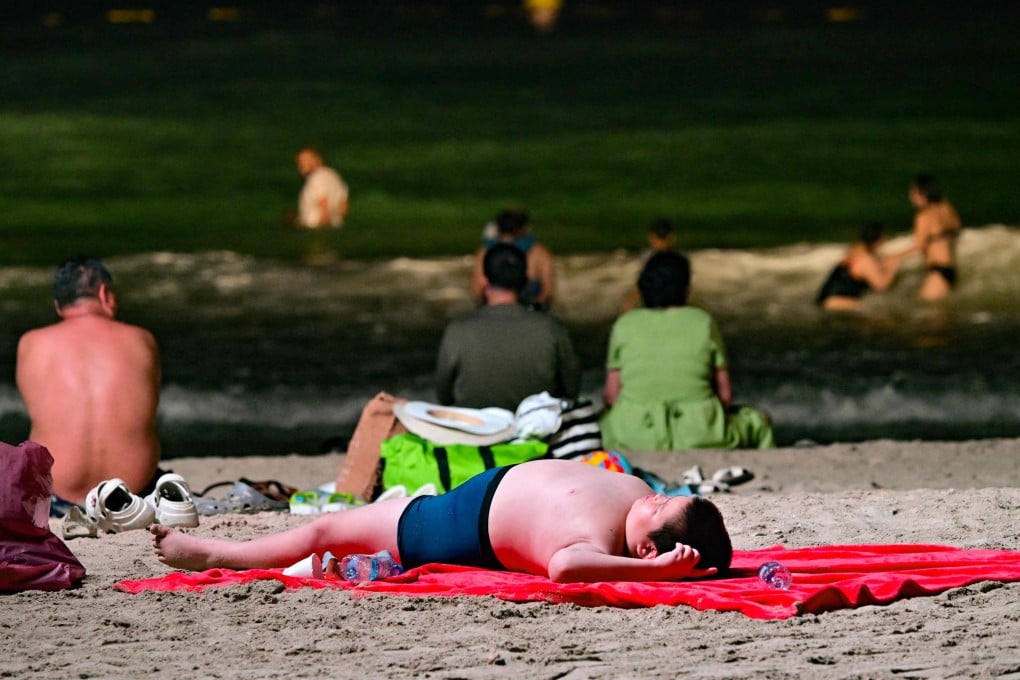 Roasted by daytime summer temperatures too hot for the beach, Dubai has turned to an innovative solution: opening beaches at night. Photo: AFP