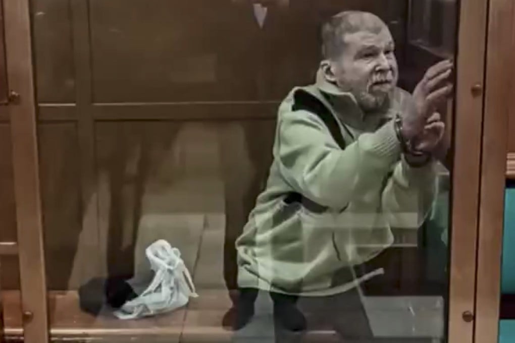 US citizen Stephen Hubbard, inside a glass cage during the verdict announcement, in the Moscow City court on October 7. Photo: EPA-EFE/Moscow City Court Press Service