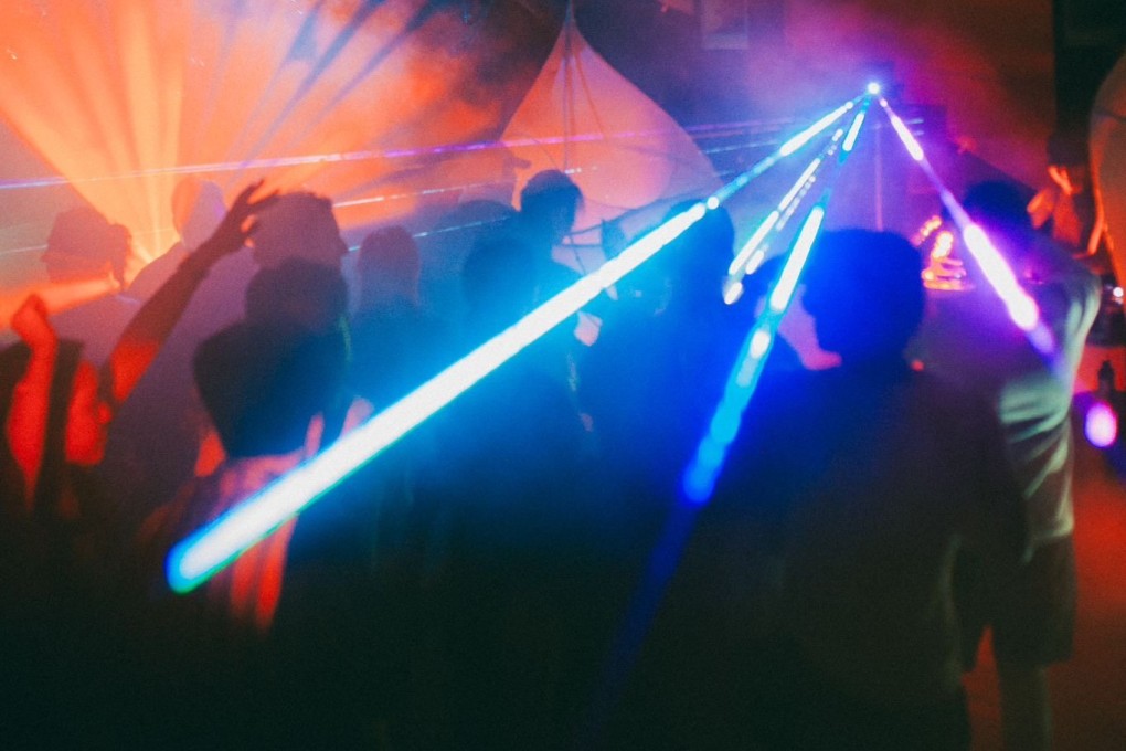People dance during the inaugural Midori electronic music festival in Hong Kong in May. The festival features entirely locally based DJs and celebrates underground electronic music and the city’s extensive natural landscape. Photo: Jake Aaron Morton / Y2K, Omni Agency