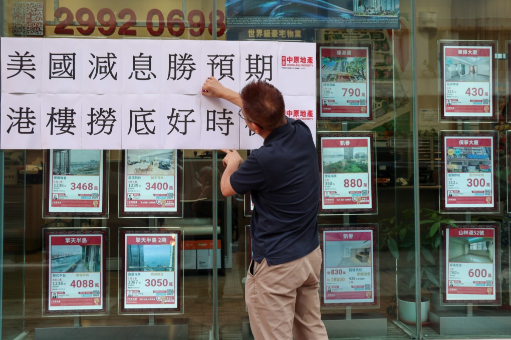 Outside a real-estate agency in Kowloon. Photo: SCMP/Jelly Tse