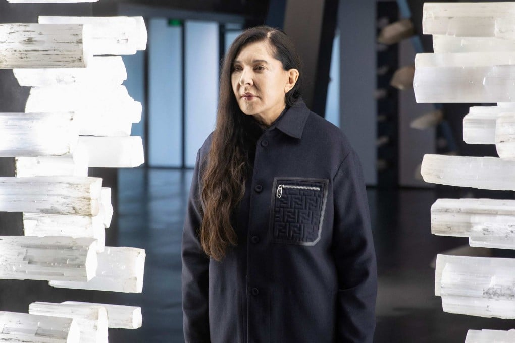 Conceptual and performance artist Marina Abramovic poses with a new artwork embedded with crystals ahead of the opening of her first exhibition in China, “Transforming Energy”, at Shanghai’s Modern Art Museum. Photo: AFP