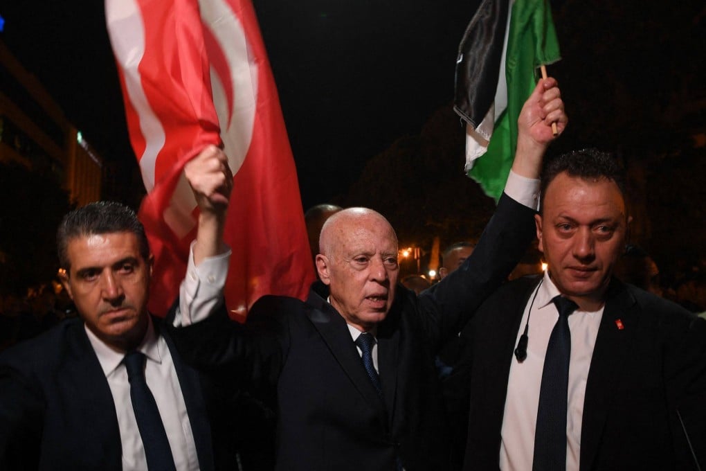 Tunisia’s President Kais Saied celebrates after being re-elected. Photo: Tunisian Presidency via AFP