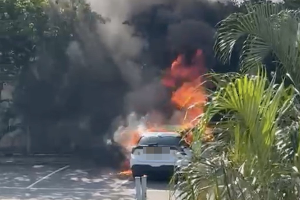The car in flames in Wong Chuk Wan near Sai Kung on Tuesday morning. Photo: SCMP