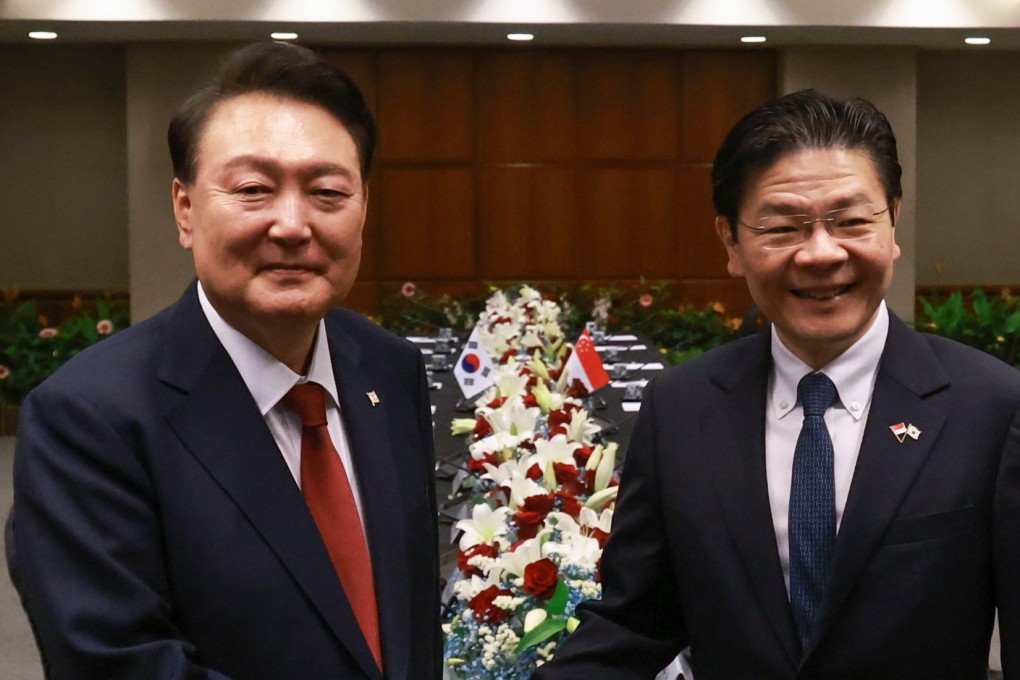 South Korean President Yoon Suk-yeol (left) poses with Singapore’s Prime Minister Lawrence Wong before a meeting at Parliament House in Singapore on Tuesday. Photo:  EPA-EFE/Yonhap