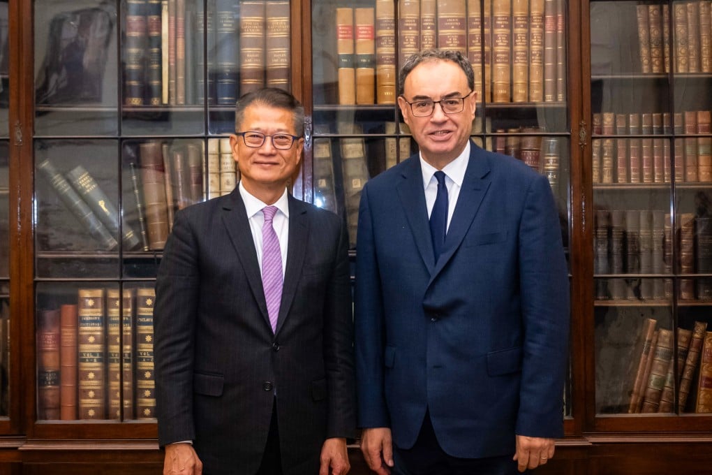 Hong Kong’s finance chief Paul Chan (left) meets with the Governor of the Bank of England, Andrew Bailey, in London on September 26. Photo: ISD handout