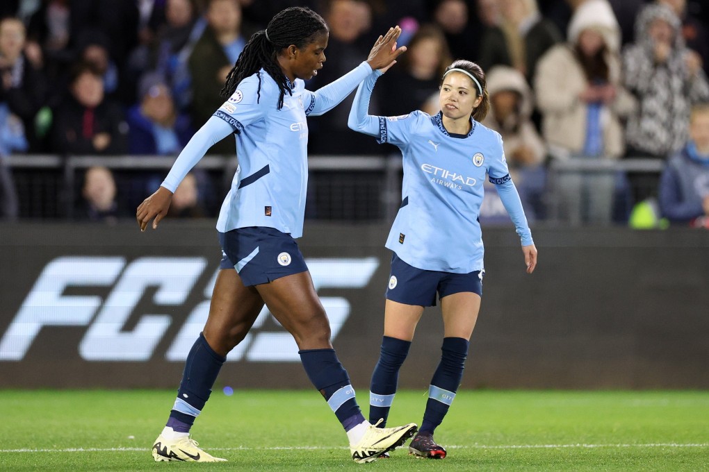 Bunny Shaw (left) celebrates with her Manchester City teammate Yui Hasegawa after scoring against Barcelona in the Uefa Women’s Champions League. Photo: EPA
