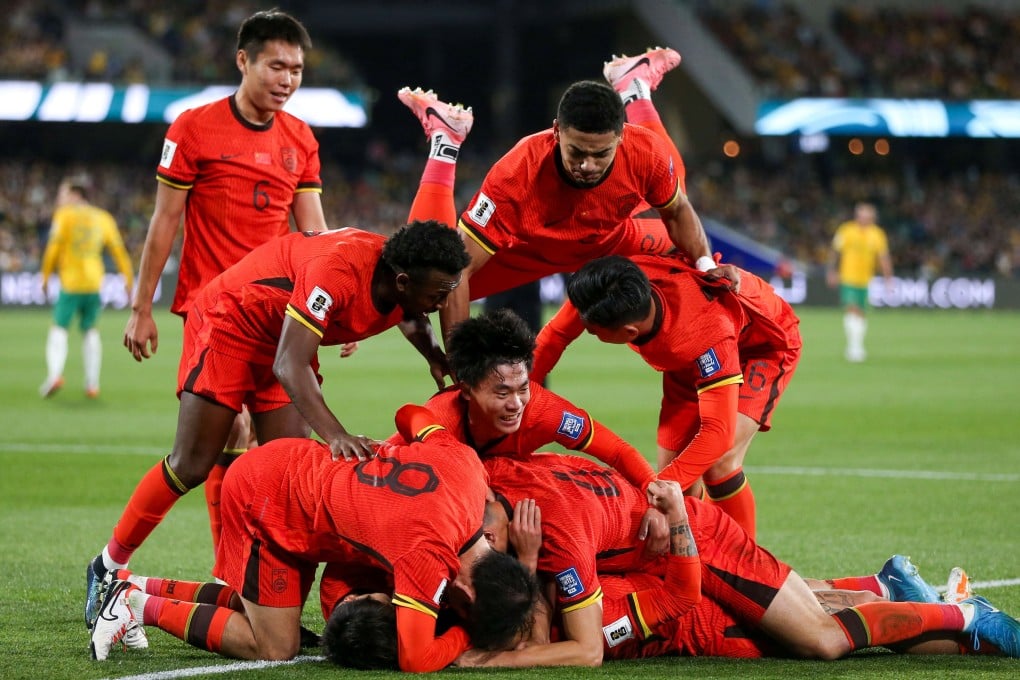 China’s Xie Wenneng celebrates scoring the opening goal against Australia at Adelaide Oval. Photo: AAP Image via Reuters