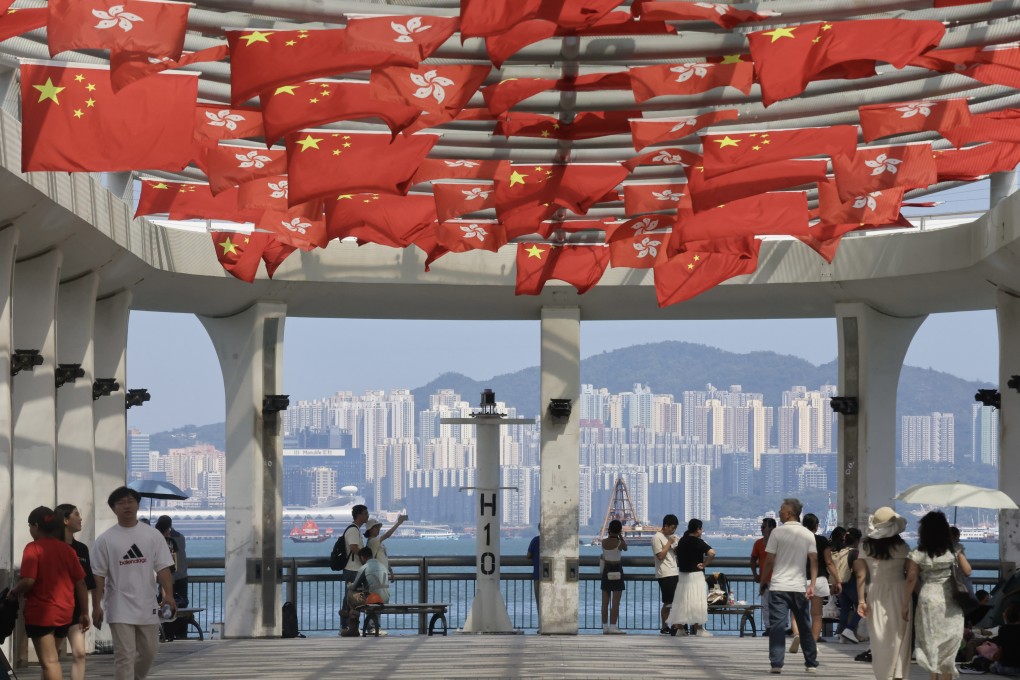 Tourists visit Central Pier. Immigration Department figures showed mainland Chinese made about 1.2 million trips to the city between October 1 and 7. Photo: Jonathan Wong