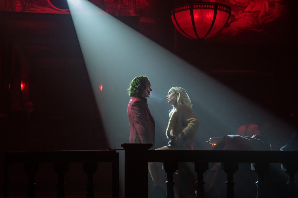 Joaquin Phoenix as the Joker (left) and Lady Gaga as Harley Quinn in a still from Joker: Folie a Deux, sequel to the successful Joker. Photo: TNS