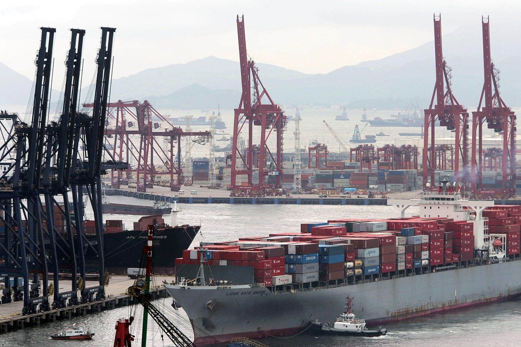 Cargo ships are loaded and unloaded in Hong Kong in July 2004. Today, the city’s maritime services and shipping sectors face transformative challenges. Photo: AFP