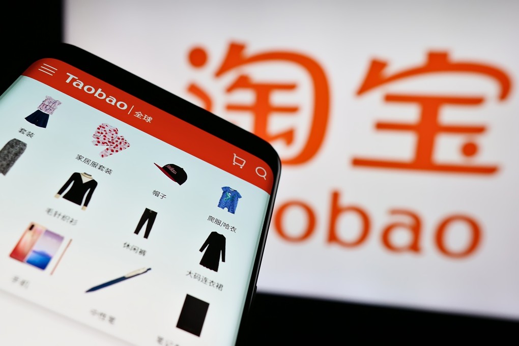 A mobile phone shows the Taobao website with its logo behind. Photo: Shutterstock Images