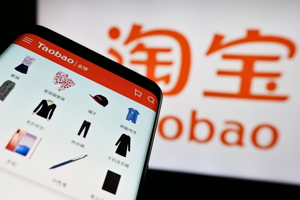 A mobile phone shows the Taobao website with its logo behind. Photo: Shutterstock Images