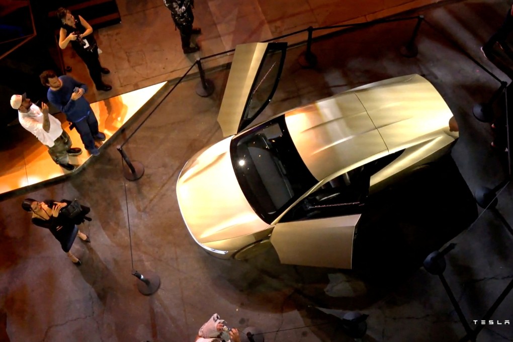 Tesla’s robotaxi is displayed at an unveiling event in Los Angeles, October 10, 2024, in this still image taken from a video. Photo: Handout via Reuters