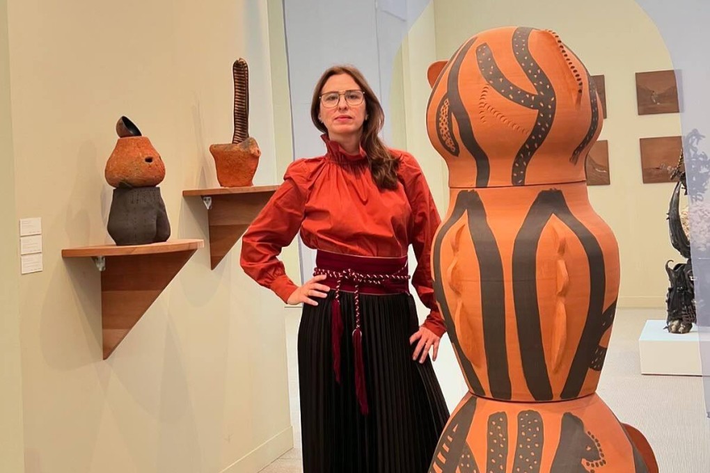 Artist Lucia Pizzani with ceramic works at Frieze London 2024’s “Smoke” section. Photo: Instagram/luciapizzani