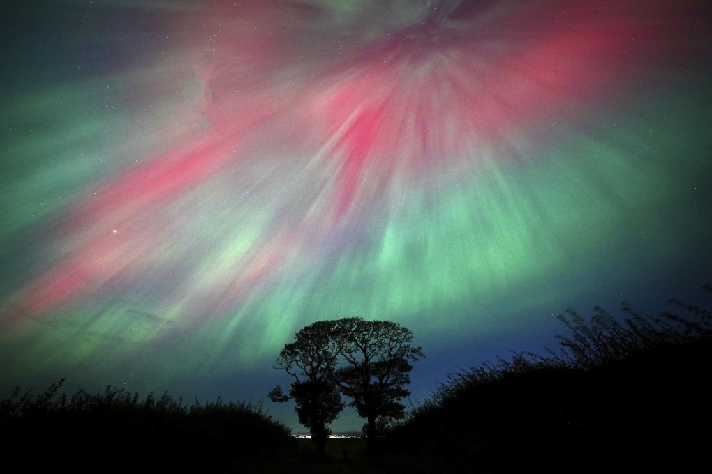 The northern lights, also known as the aurora borealis, seen over Scotland. Geomagnetic storms can cause the phenomena. Photo: AP