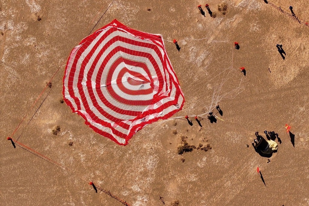 China retrieves its first reusable and returnable test satellite, Shijian-19, at the Dongfeng landing site in Inner Mongolia autonomous region on Friday morning. Photo: EPA-EFE/Xinhua