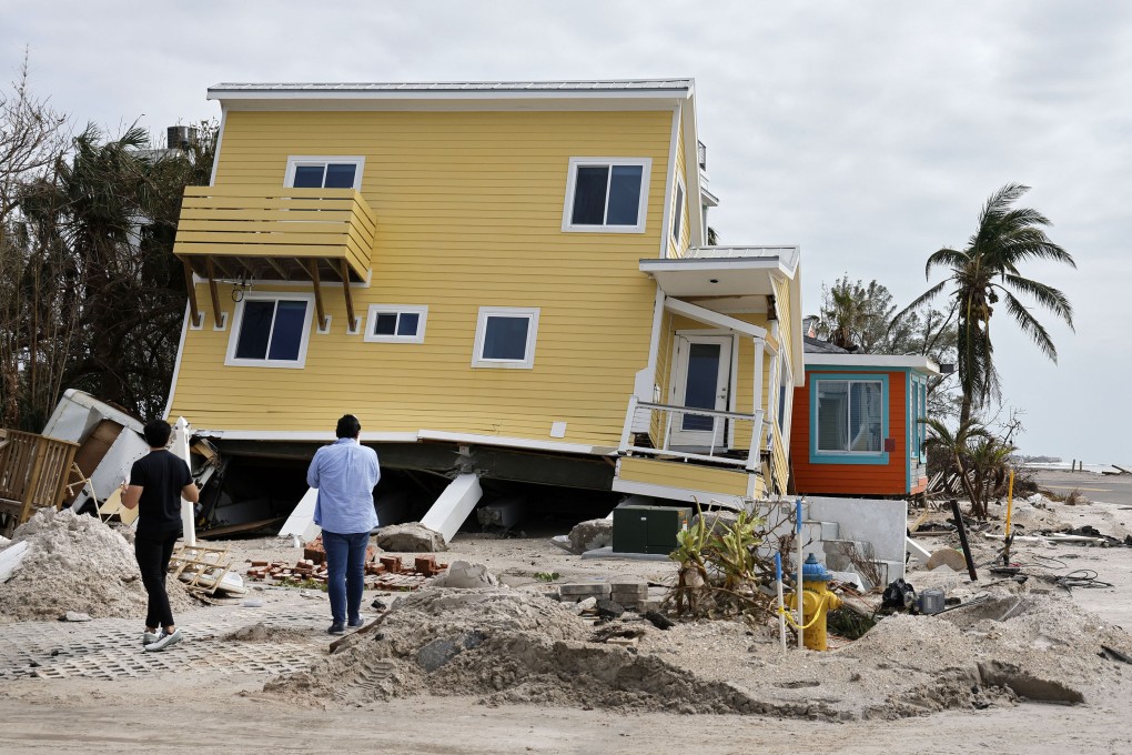 A house toppled during Hurricane Milton in Bradenton Beach, Florida. Indigenous tribes of the Caribbean coined the word from which the English “hurricane” derives. Photo: TNS