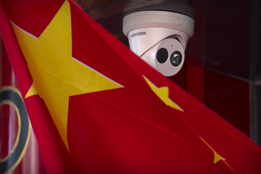 A Hikvision security camera outside a shop in Beijing. Photo: AP