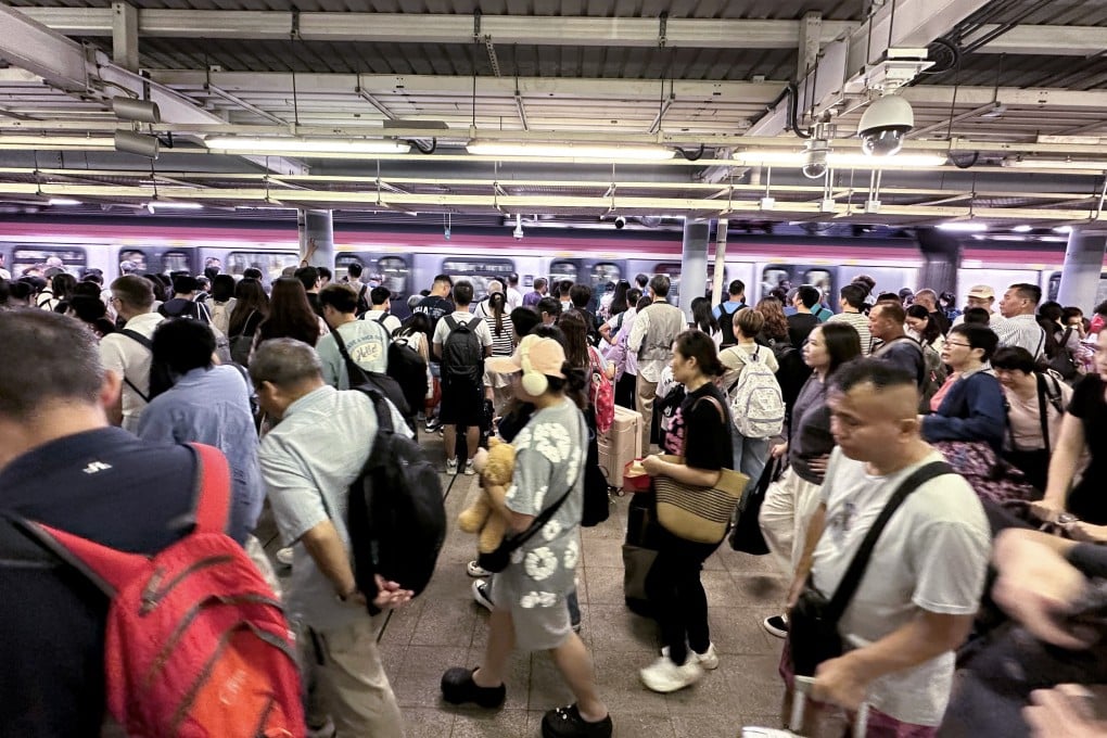Travellers arrive at Lo Wu from mainland China on Sunday. Photo: Oscar Liu