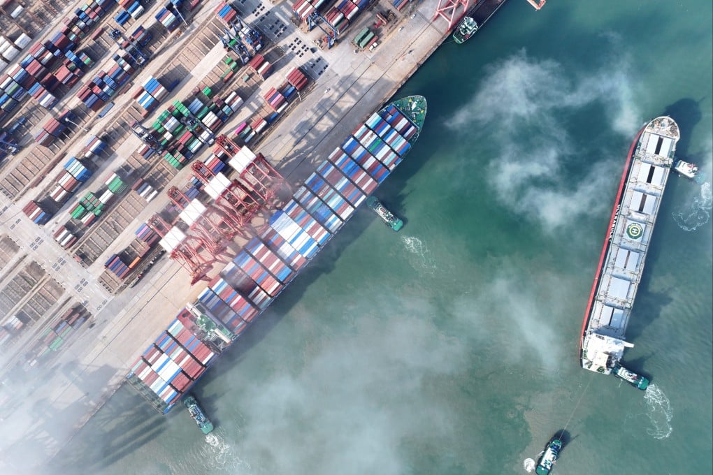 A cargo ship docks at the berth for loading and unloading operations at the container terminal in Lianyungang, China. Photo: NurPhoto via Getty Images