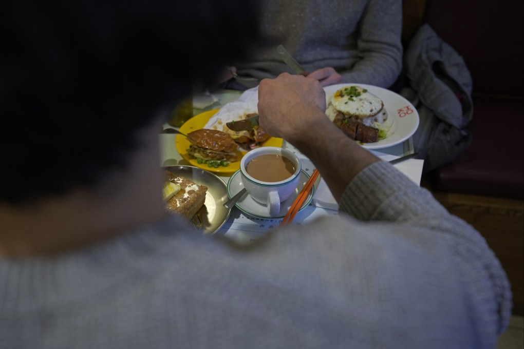 Hong Kong-style milk tea is served with popular Hong Kong fare at the HOKO Cafe, a pop-up cafe in the trendy London neighborhood of Shoreditch. Photo: AP