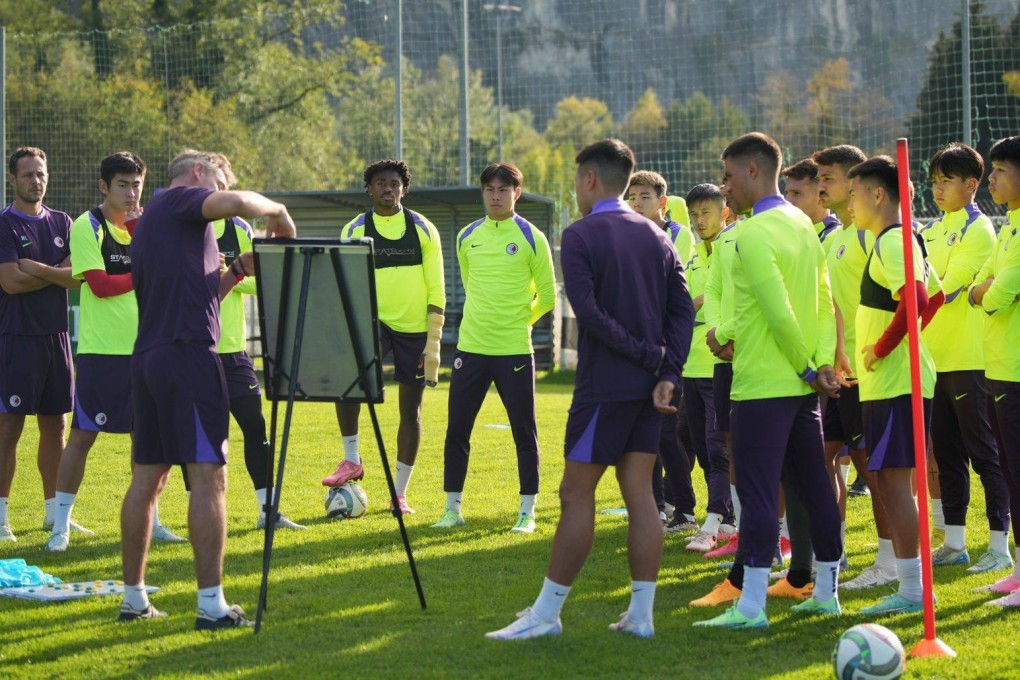 Hong Kong’s players listen to head coach Ashley Westwood during training. Photo: HKFA