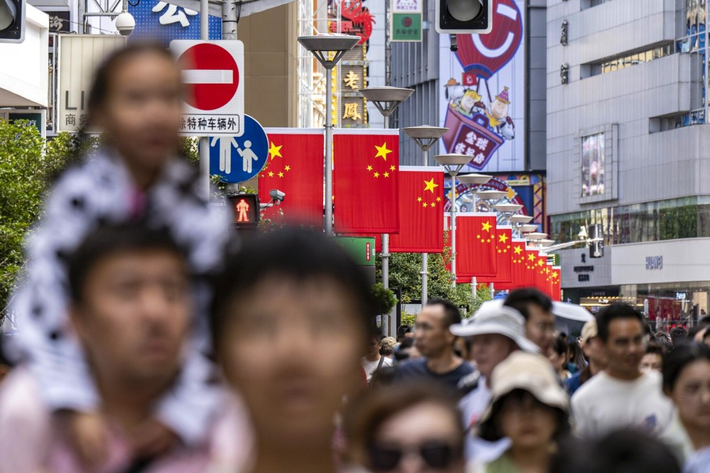 Chinese flags on Nanjing East Road in Shanghai. Photo: Bloomberg