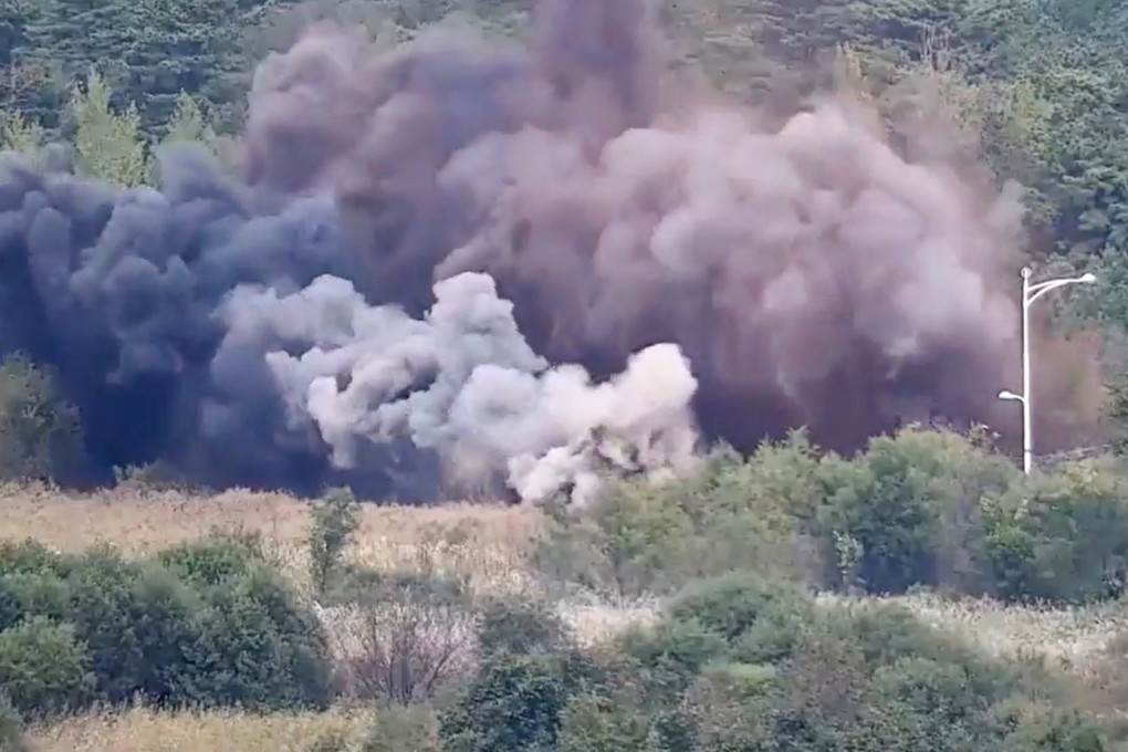 Surveillance footage shows North Korea’s blowing up of part of the Donghae Line road on Tuesday. Photo: EPA-EFE/South Korea’s Joint Chiefs of Staff