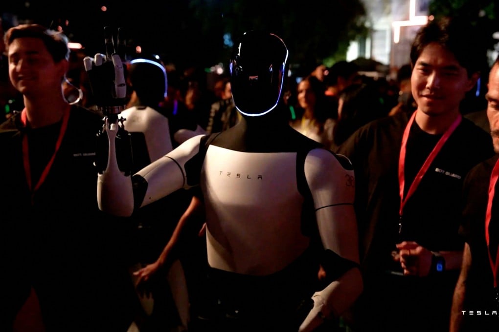 Tesla’s Optimus robot gestures at an unveiling event in Los Angeles, California last week. Photo: Handout via Reuters
