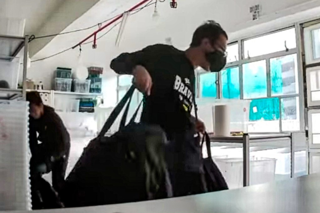 A source says the three burglars captured by a surveillance camera were thought to be aged between 30 and 40 and all around 1.8 metres tall. Photo: Facebook/Kwan Wan Cheung Captain