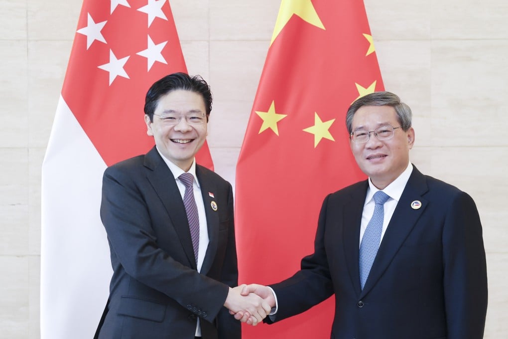 Singapore’s Prime Minister Lawrence Wong with China’s Premier Li Qiang in Vientiane last Friday. Photo: Xinhua