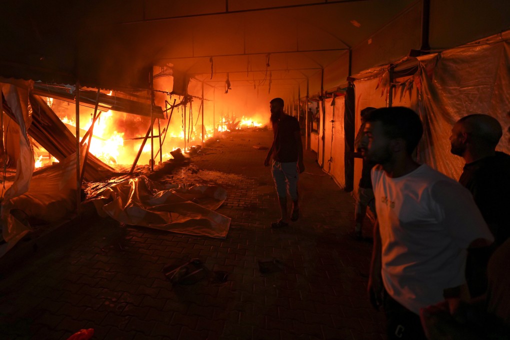 An Israeli strike started a fire on a tent area in a Gaza hospital courtyard on Monday. Photo: AP