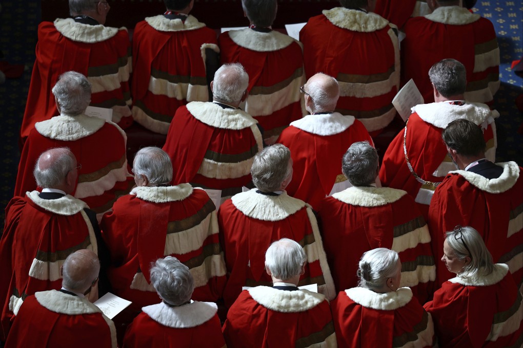 Members of the House of Lords take their seats ahead of the State Opening of Parliament in London in July. Photo: AP