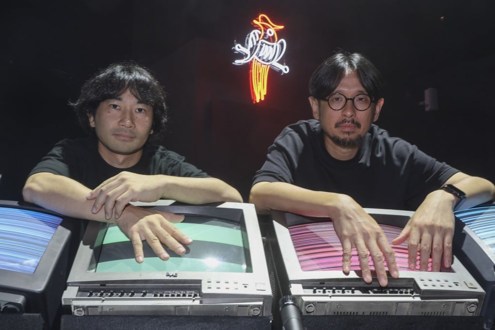 Japanese sound artist Ei Wada (left) and Hong Kong new media artist Keith Lam ahead of their performances of Remediation Ensemble at The Theatre at the East Kowloon Cultural Centre in Kowloon Bay, Hong Kong. The show will also feature musician Akira Ataka, rapper Gold Mountain and drummer Kitt Lau. Photo: Edmond So