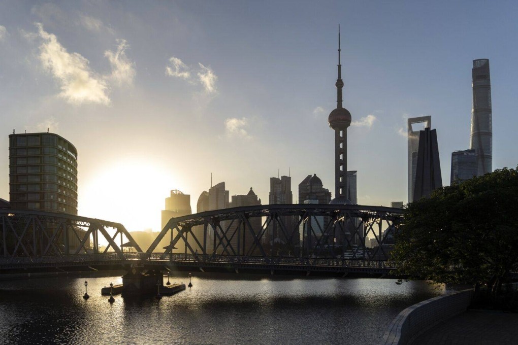 A proposed law to boost private sector confidence in the economy should include measures to elevate the legal status of private firms, which were a “source of vitality”, says economist Teng Tai. Photo: Bloomberg