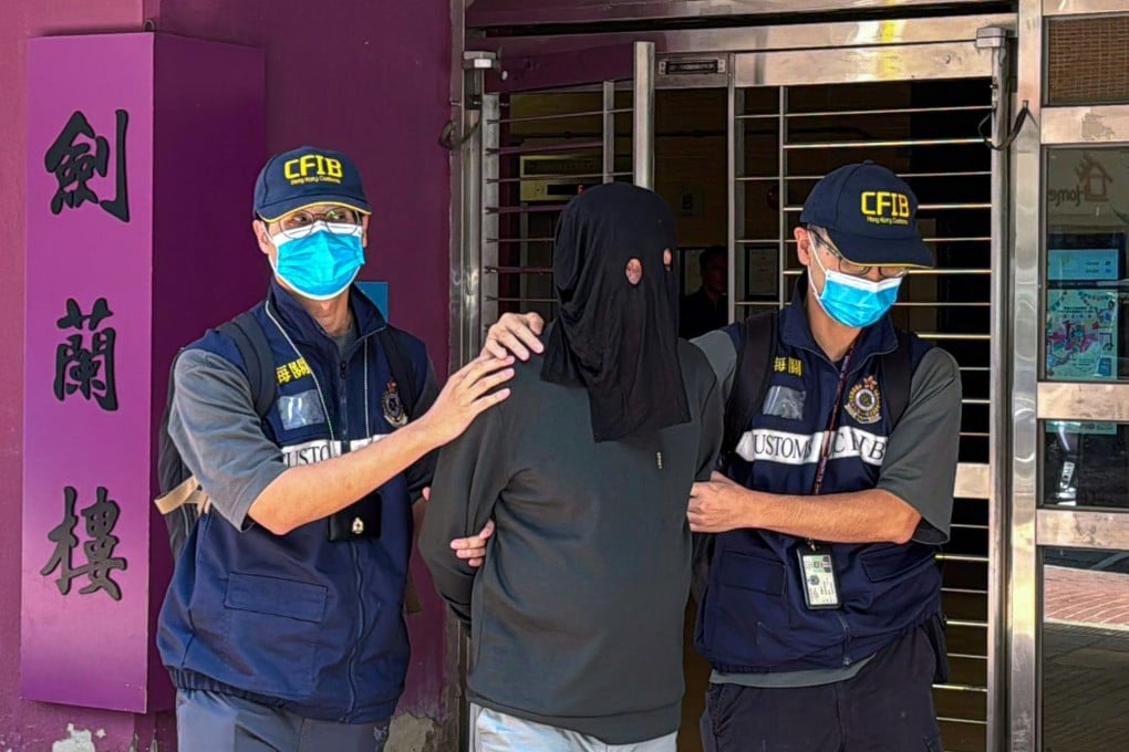 A bank manager is among five men arrested by Hong Kong customs in a crackdown on a local money-laundering syndicate. Photo: Handout