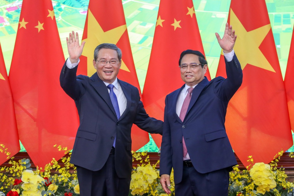 Chinese Premier Li Qiang with Vietnamese counterpart Pham Minh Chinh, in Hanoi on Sunday. Photo: EPA-EFE