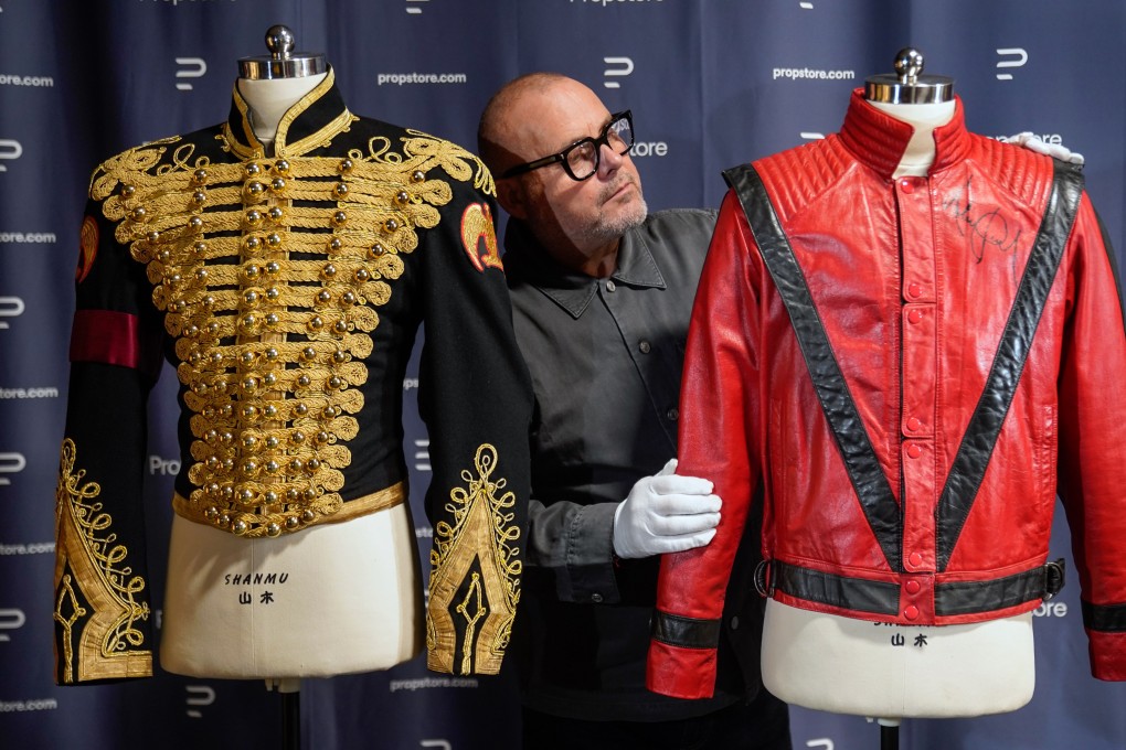 Michael Jackson’s autographed tour rehearsal Thriller jacket, and his black-and-gold military-style jacket are up for auction in the UK in November. Photo: DPA