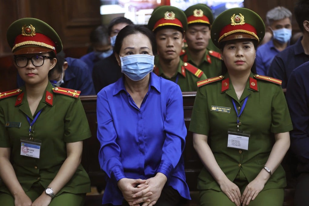 Vietnamese real estate tycoon Truong My Lan (middle) sits in court to wait for her verdict. She was already convicted in April by the same Ho Chi Minh City court of fraud amounting to US$12.5 billion. Photo: AP