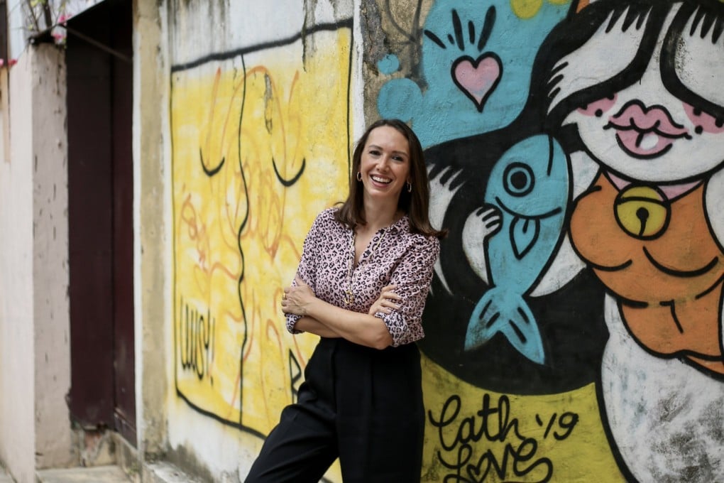 Claire Yates behind The Lion Rock Press headquarters in Sheung Wan 2022. Photo: Jennifer Robertson