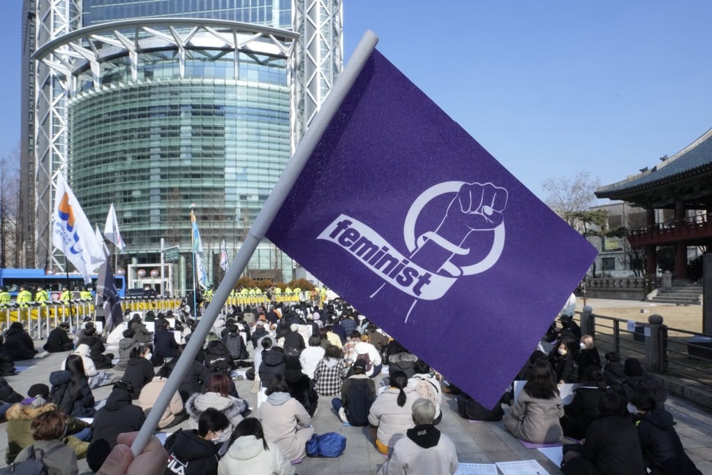 People stage a rally supporting feminism in Seoul, South Korea. Amid a deeply entrenched culture of misogyny and harassment, Korean women have been attacked for having short hair. Photo: AP