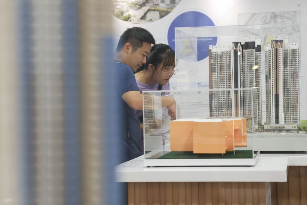 People visit a subsidised housing sales exhibit. Photo: Jelly Tse