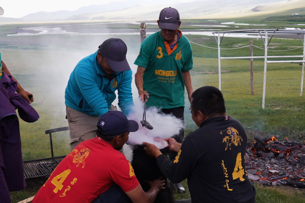 Mongolian people prepare a boodog feast at the Genghis Khan Retreat in the Orkhon Valley, Mongolia, in October 2024. Photo: Llewellyn Cheung