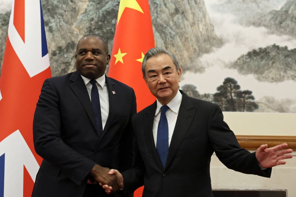 British Foreign Secretary David Lammy  and Chinese Foreign Minister Wang Yi  before their meeting in Beijing on Friday. Photo: AFP