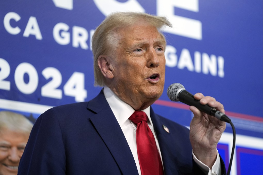 Republican US presidential nominee speaks as he visits a campaign office in Hamtranck, Michigan, on Friday. Photo: AP