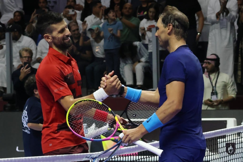 Novak Djokovic and Rafa Nadal meet at the net at the end of what was likely their final ever meeting. Photo: Xinhua