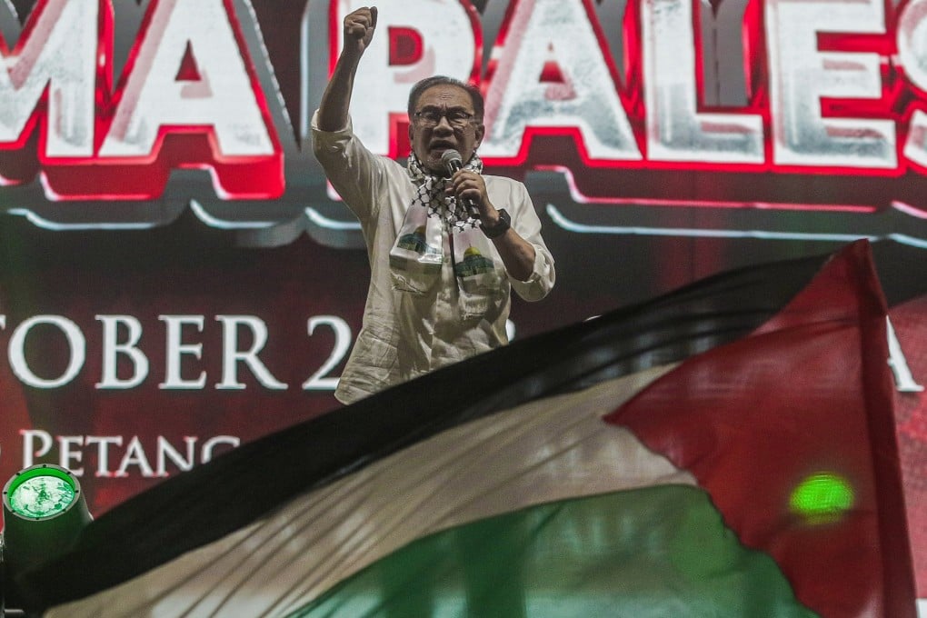 Malaysia’s Prime Minister Anwar Ibrahim delivers a speech at a ‘Malaysia Stands with Palestine’ solidarity rally in Kuala Lumpur last year. Photo: EPA-EFE