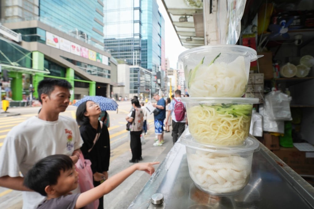 Takeaway food is offered in plastic containers at a restaurant in Sham Shui Po. From Tuesday, businesses that flout the plastics ban face a HK$2,000 fine. Photo: Eugene Lee