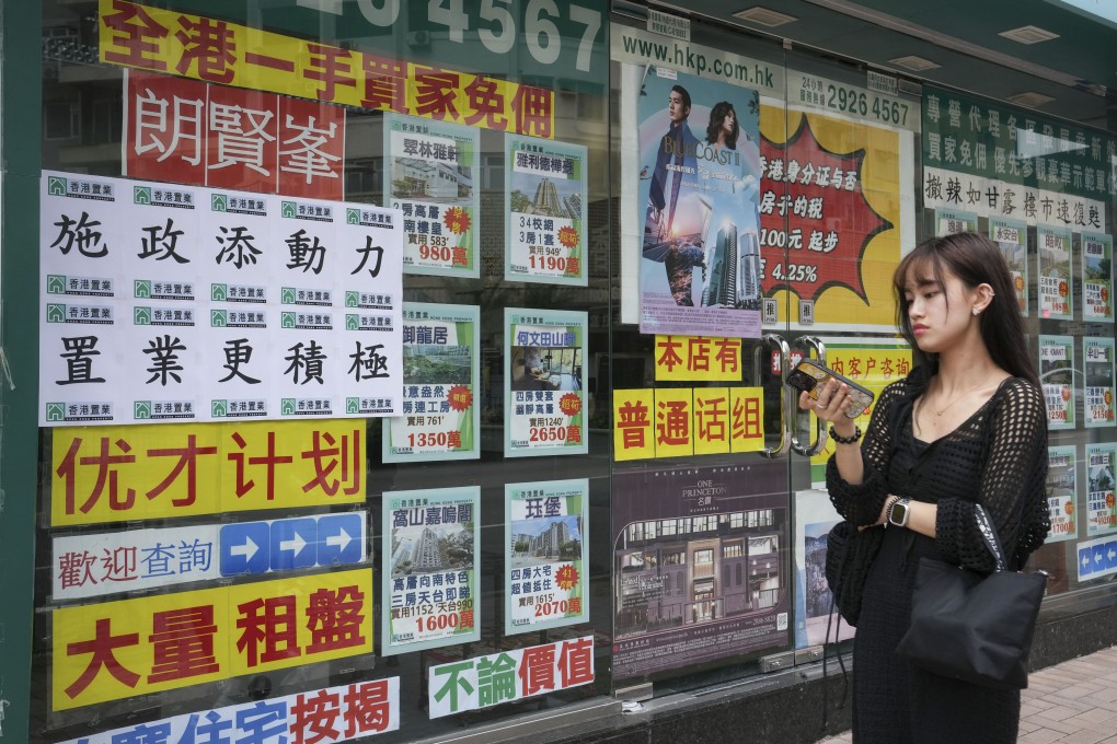 Notices in Mong Kok encouraging buyers to take advantage of new property support measures in the 2024 policy address. Photo: Elson Li